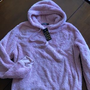Light pink plush hoody pullover.
